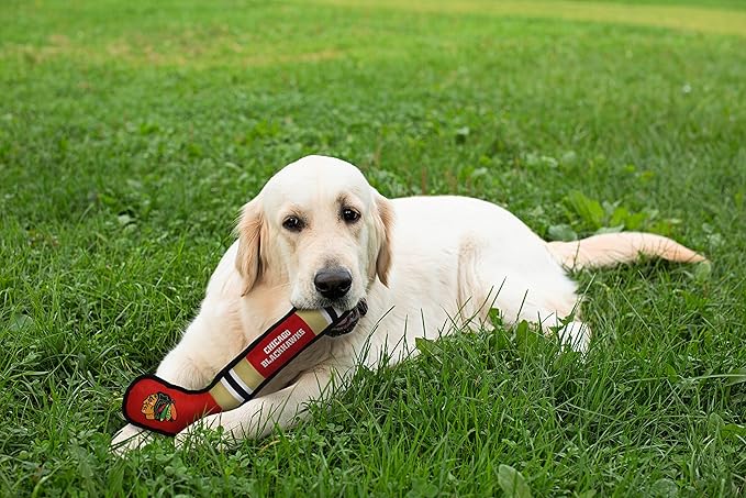 Pets First Dog Toy Tough Nylon with Inner Squeaker Licensed by NHL Chicago Blackhawks Hockey Stick Toy for Dogs & Cats. Play Hockey with Your Pet with This Licensed Dog Tough Toy